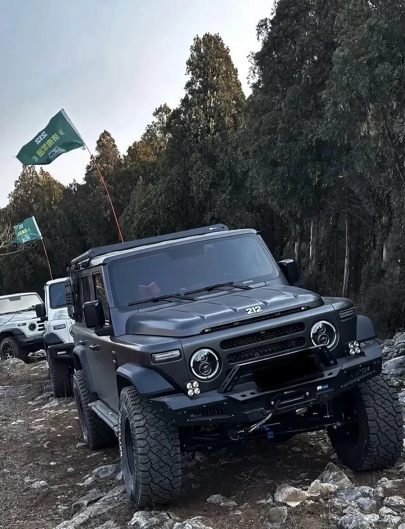 Convoy climbing a rocky trail on Veteran tires