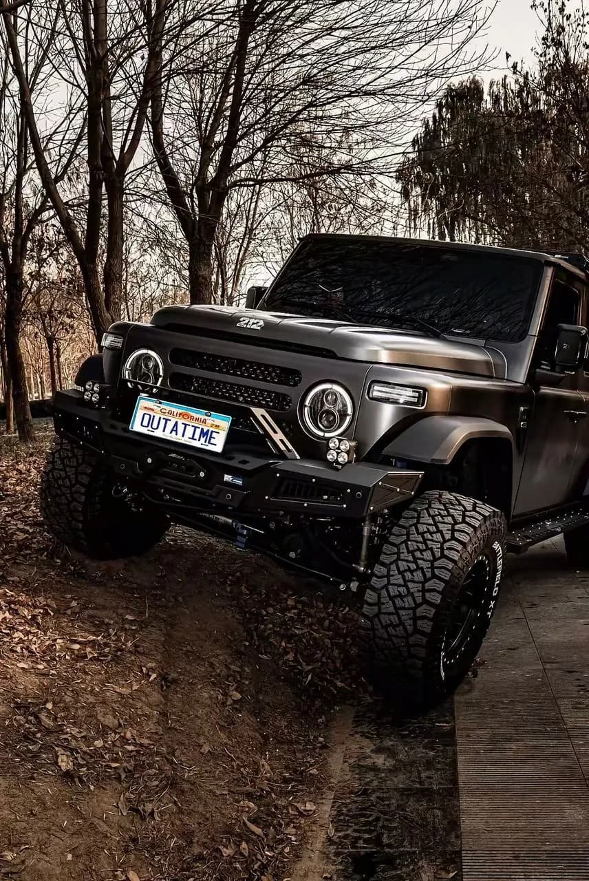 Off-road SUV flexing on a trail with Battlefield XT tires